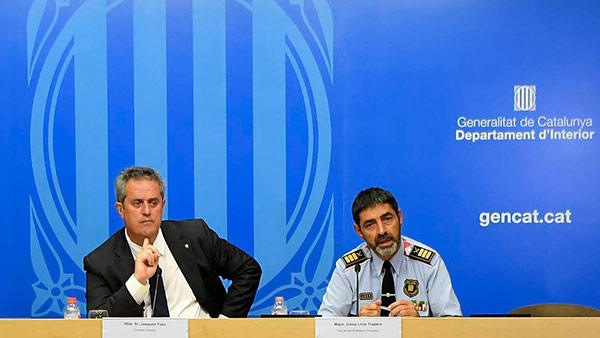 Josep Lluis Trapero, major dels Mossos, y el conseller de Interior, Joaquim Forn. Foto: Lluis Gene | AFP mossos-cia